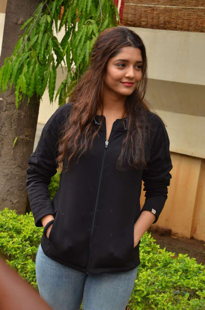 Ritika Singh exudes coolness in a black outfit, showcasing her stylish and confident demeanor.