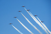 . passed overhead during the finale of the Canadian International Air Show . (cias snowbirds)