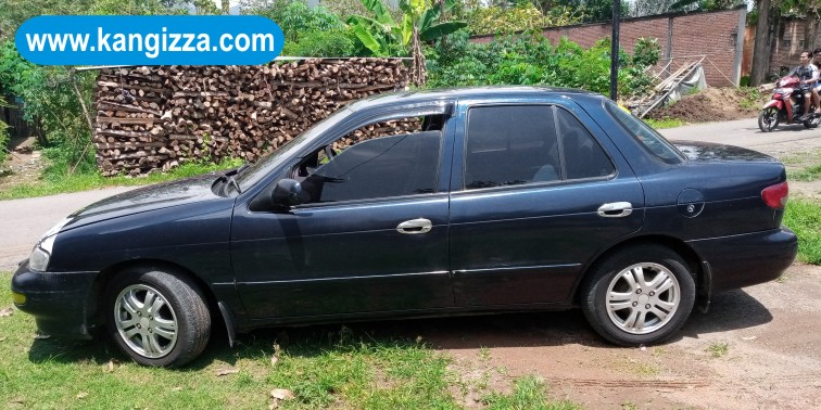 mobil sedan bekas murah dohc