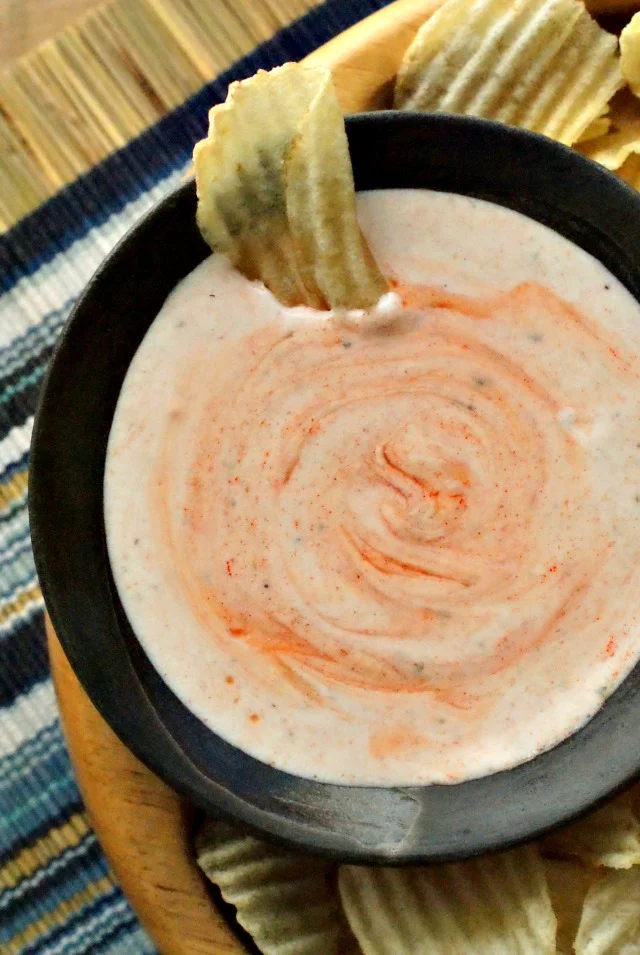 You only need three ingredients to make this cool, creamy, spicy Buffalo Ranch Chip Dip!  Once you start dipping, you won't be able to stop!