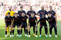 R. C. D. MALLORCA. Temporada 2022-23. Predrag Rajković, Dennis Hadžikadunić, Copete, Muriqi, Valjent. Manu Morlanes, Ruiz de Galarreta, Jaume Costa, Antonio Sánchez, Amath Ndiaye y Kang In Lee. GIRONA F. C. 2 🆚 R. C. D. MALLORCA 1 Jueves 04/05/2023, 19:30 horas. Campeonato de Liga de 1ª División, jornada 33. Girona, estadio Municipal de Montilivi: 11.767 espectadores. GOLES: ⚽1-0: 45+2’, Bernardo Espinosa. ⚽1-1: 80’, Muriqi, de penalti. ⚽2-1: 84’, Taty Castellanos.