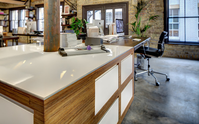 Picture of brown and white working desk in the attic office