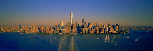 Photo of new complex at sunset as seen from the bay