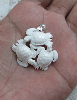 Turtle Group Carved Bone Pendant