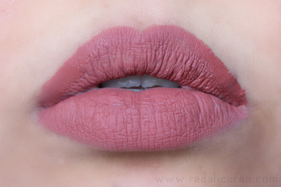 Whizzle lip swatches putting matte lipstick gloss over dubai