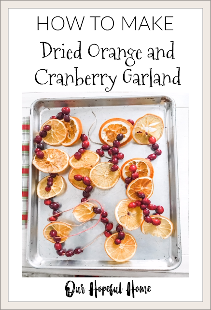 dried orange slices cranberry twine Christmas garland silver tray