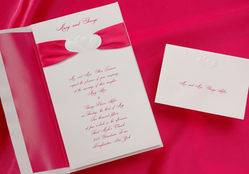 Our Hot Pink double hearts wedding invitation package is sure to please all