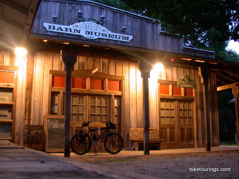 Picture of touring bike parked outside of local historical landmark