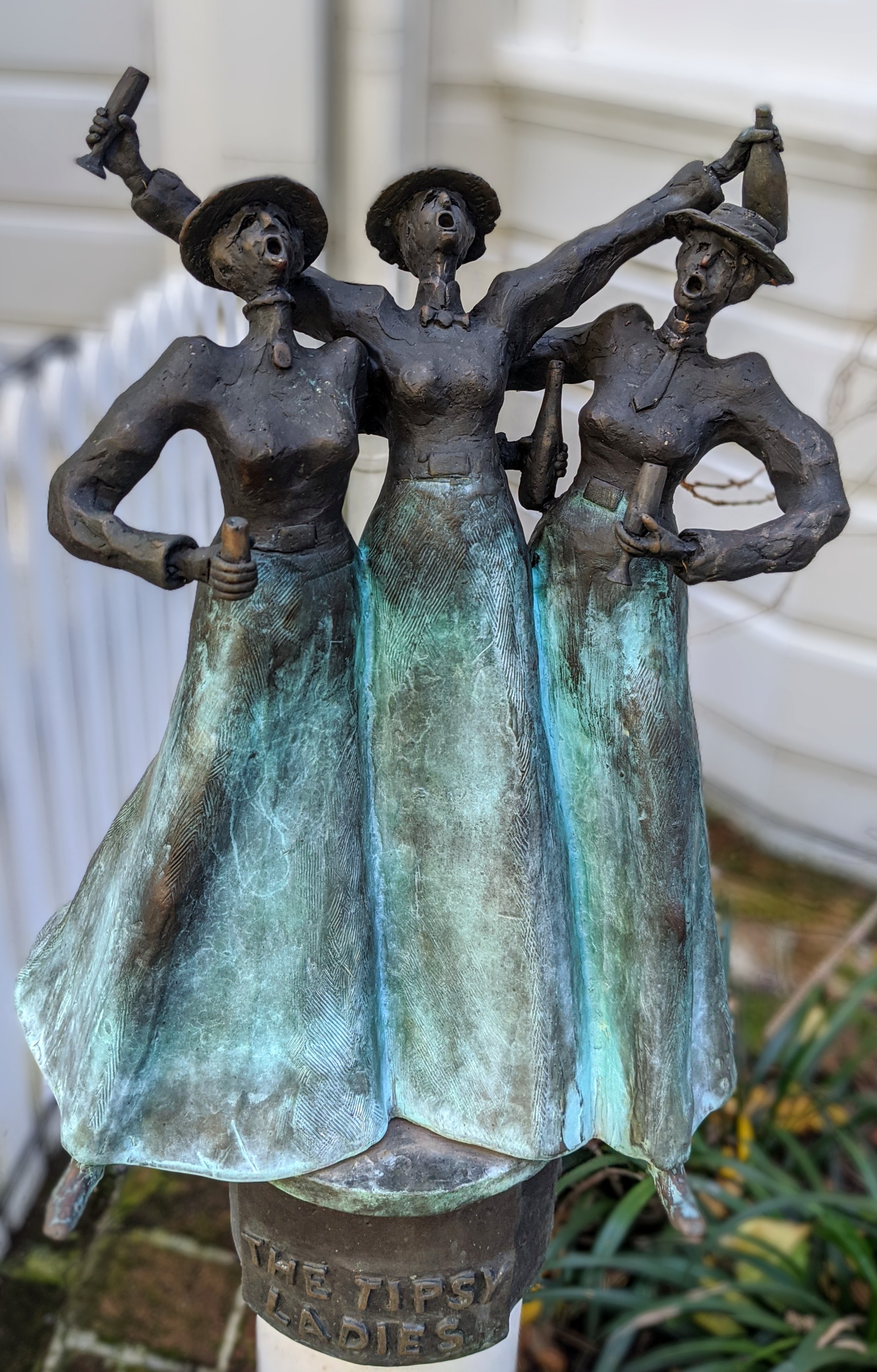 'Tipsy Ladies' statue of 3 revelling Edwardian ladies with bottles in their hands