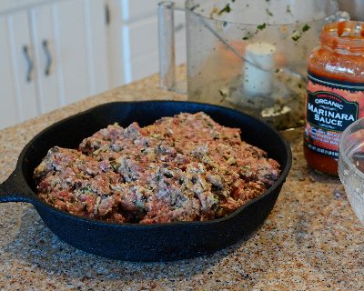 Cast Iron Meatloaf ready for the oven ♥ KitchenParade.com, my go-to meatloaf recipe, tender, moist and full of flavor thanks to milk-soaked bread crumbs and a pile of chopped vegetables that melt into the meatloaf.