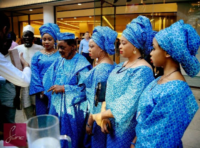 9  Photos: Alaafin of Oyo and his four wives go shopping in the UK