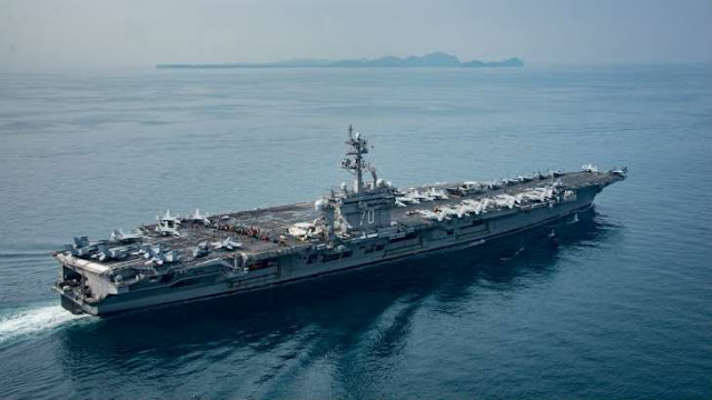 White House denies misleading public in aircraft carrier mix-up