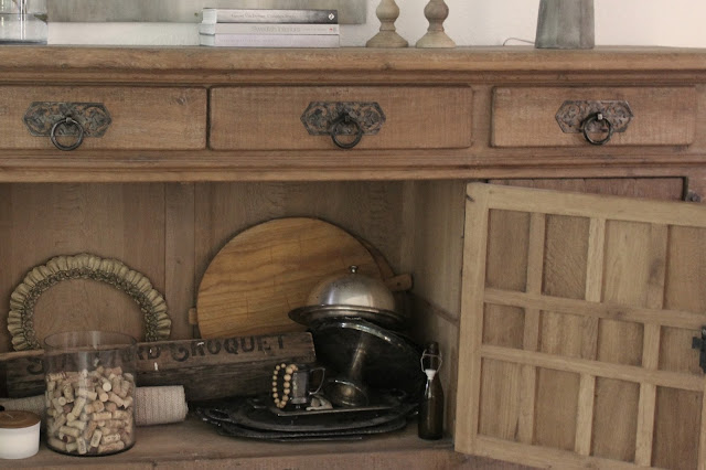 Rustic oak Belgian antique cupboard in European country styled living room by Hello Lovely Studio