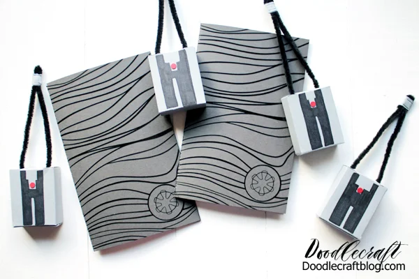 Make Mandalorian inspired party favors, gifts or things just for you in this fun tutorial. Make some Beskar steel notebooks and tracking fob goody boxes filled with candy.