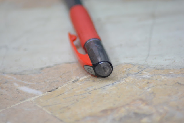 A picture of a cap with a D-Shaped hole on top