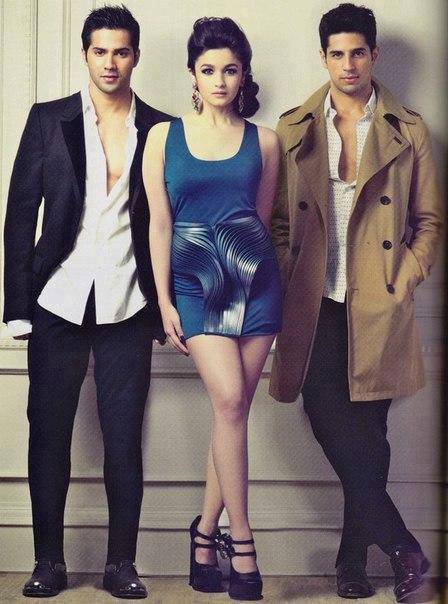 Alia bhatt in strip top and blue sheer skirt with Varun and Siddarth for Grazia.