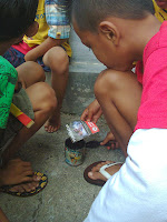 etika penulis kebetulan lewat jalan di salah satu Gang kampung di kota Banjarmasin PERMAINAN TRADISIONAL KLASIK BALOGO ANAK BANJARMASIN