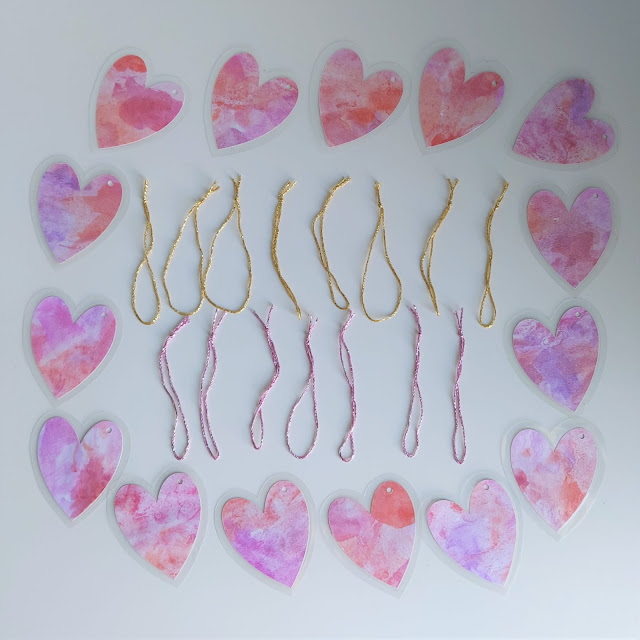 Make easy watercolour hearts with your children as Valentine's crafting.  You can use them as hanging decorations on a Valentine's tree.