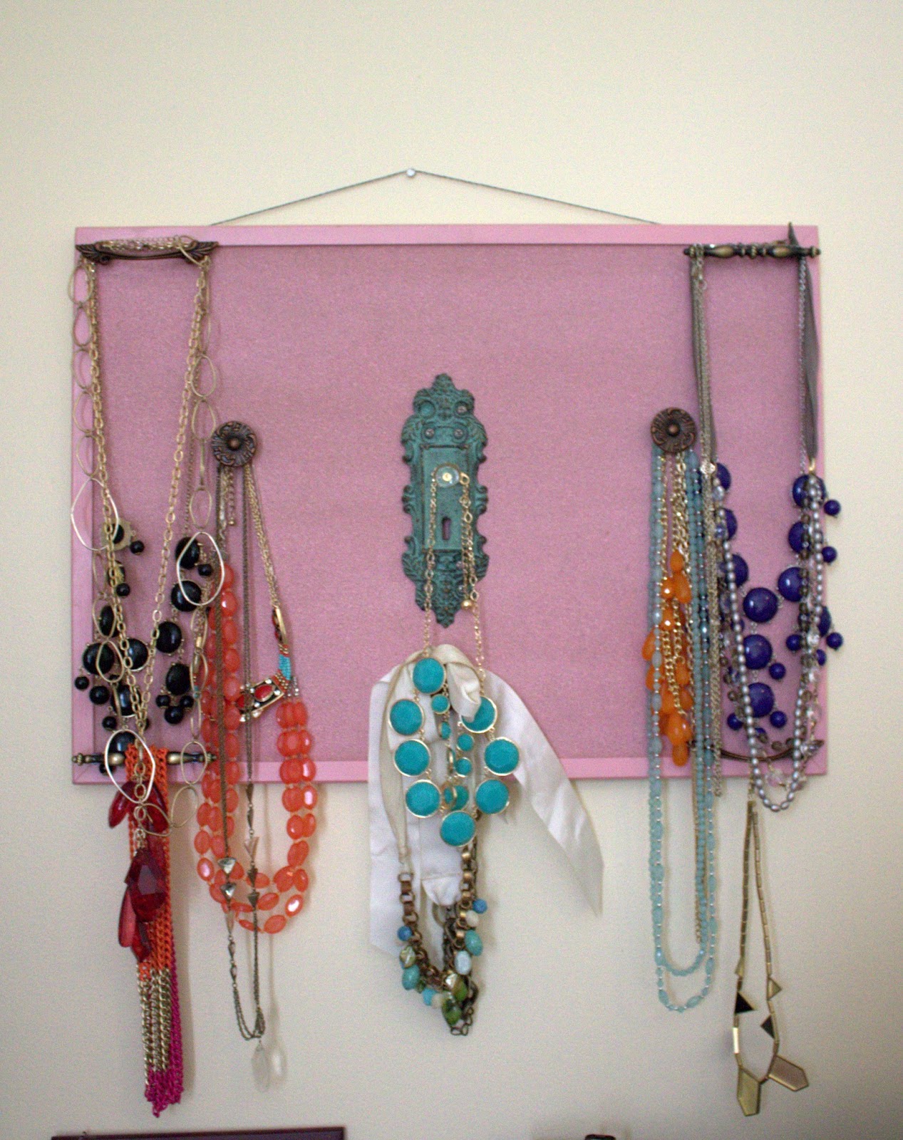 Statement necklace board. I used door knobs and drawer pulls and spray  title=