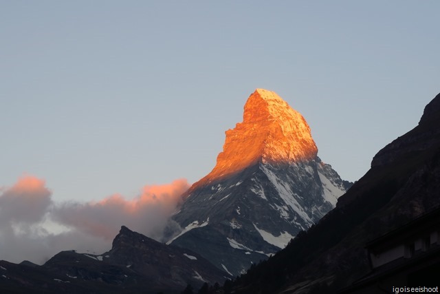 The Matterhorn at sun rise, at the time when the first rays of the sun hit its tip.