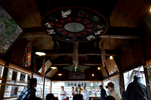 Shinto shop with Chinese Calendar in Achi-jinja