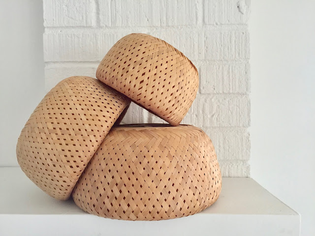 trio of vintage woven round nesting baskets