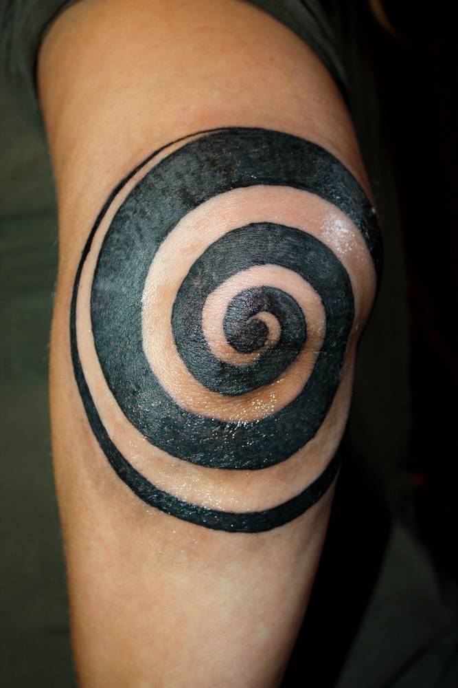 spiral tattoo. My friend came straight from a 10 day meditation retreat to 