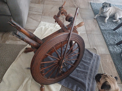 a spinning wheel in pieces