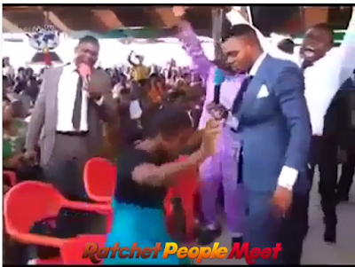 Pastor praying for a barren woman