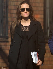 Angelina Jolie Carrying Books