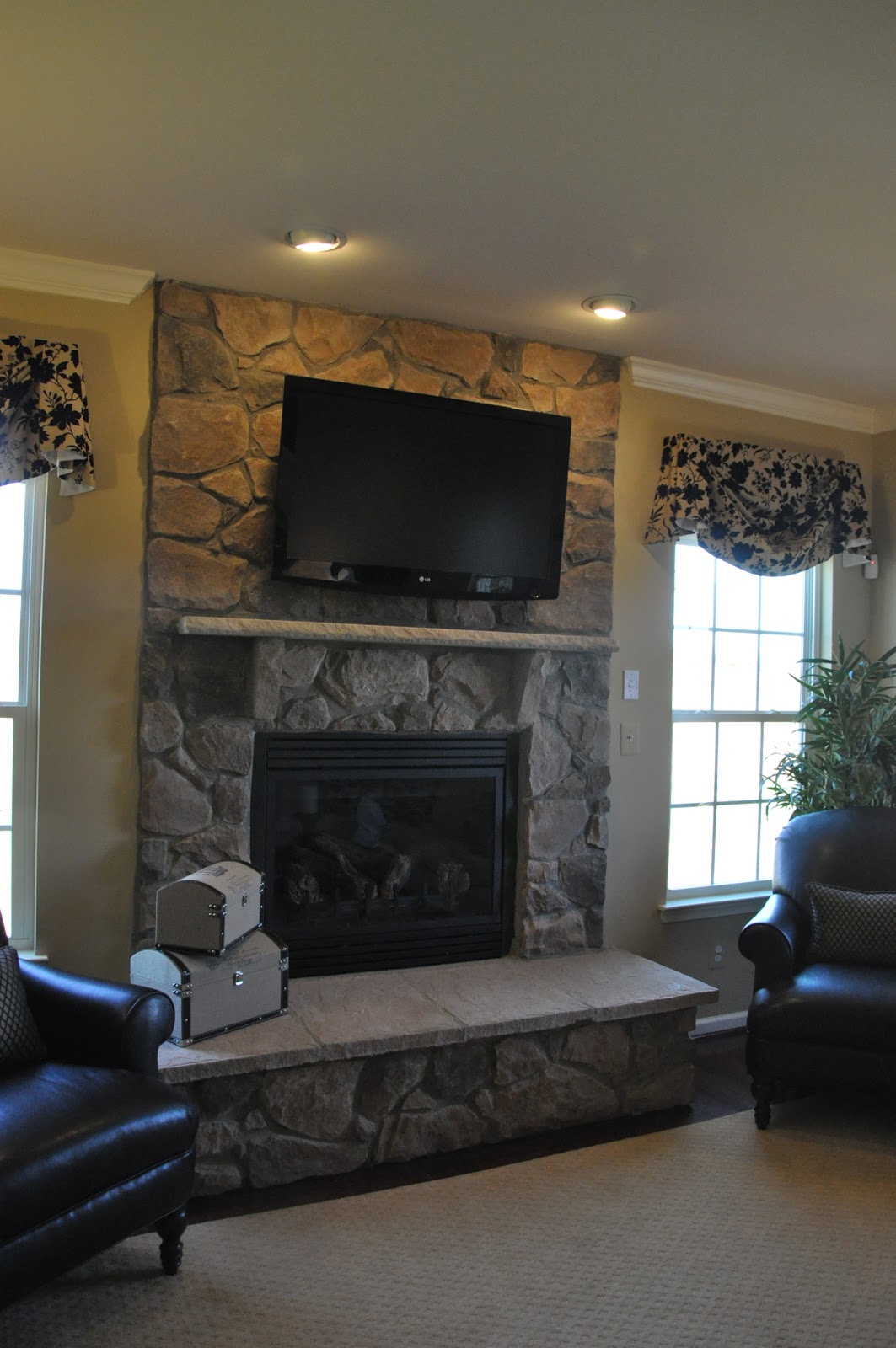 Building a Ryan Homes Ravenna: TV over the fireplace or not?