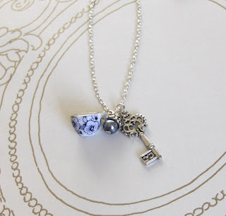 http://folksy.com/items/4986192-Teacup-necklace-Alice-in-Wonderland-