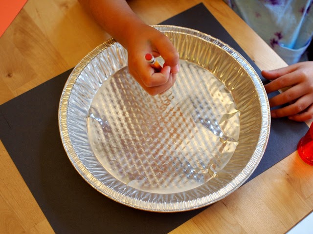 Easy Preschool space science- trace your pie pan  