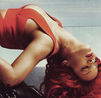 rihanna with red hair 2011. Her firey red hair is paired