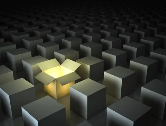 One luminous opened box among closed white square boxes