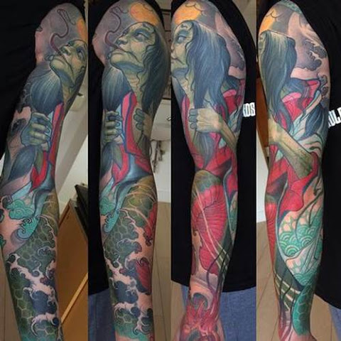 10 Beautifully Twisted Snake Lady Tattoos