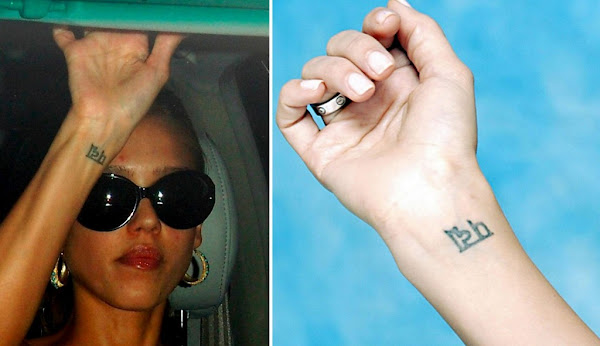 rihanna tattoos meaning. brown and rihanna kissing,