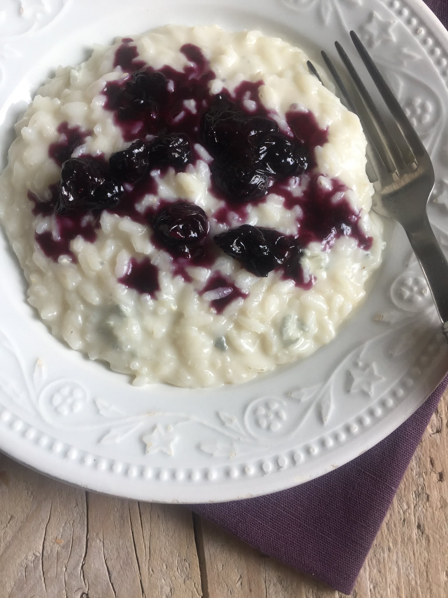 Risotto al Blu di capra e salsa ai mirtilli