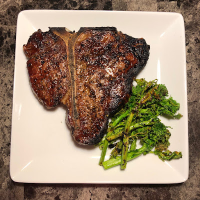 Rare grilled porterhouse with grilled broccoli rabe