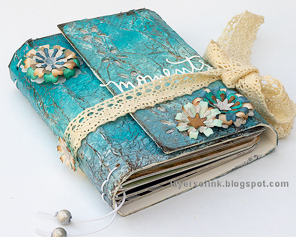 Layers of ink - Blue Textured Wrapped Journal Tutorial by Anna-Karin Evaldsson made with Eileen Hull Sizzix wrapped journal die.