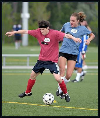 Rivers Cuomo fights for ball with young woman, Toronto photographer Robert Rafton