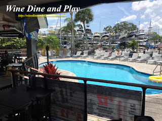 An outdoor pool next to the terrance and bar at the Ozona Blue Grill in Palm Harbor, Florida