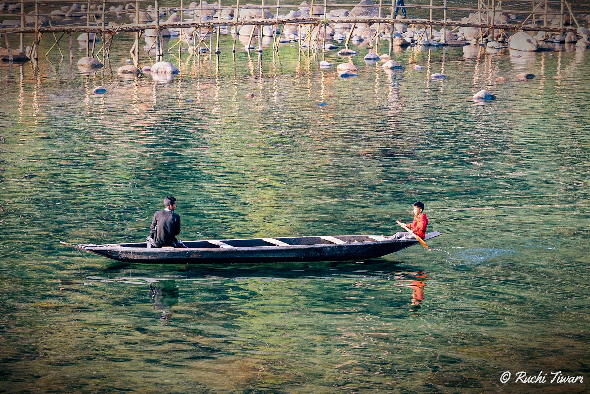 boats floating in Umngot at Shnongdeng