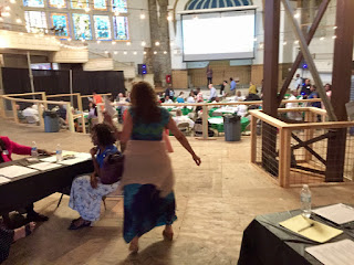 woman walks into the Clayborne Temple