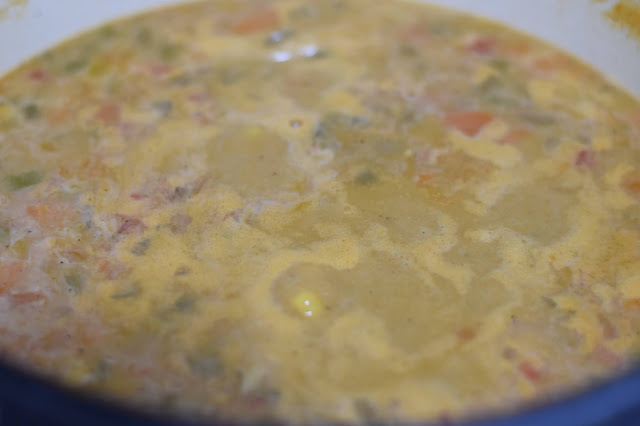 The vegan corn chowder simmering in the pot.