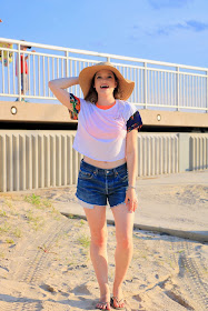 Nyc fashion blogger Kathleen Harper wearing denim cutoff shorts at the beach