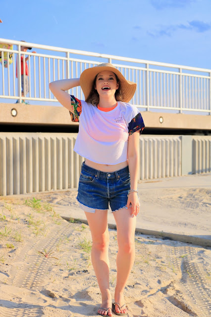 Nyc fashion blogger Kathleen Harper wearing denim cutoff shorts at the beach