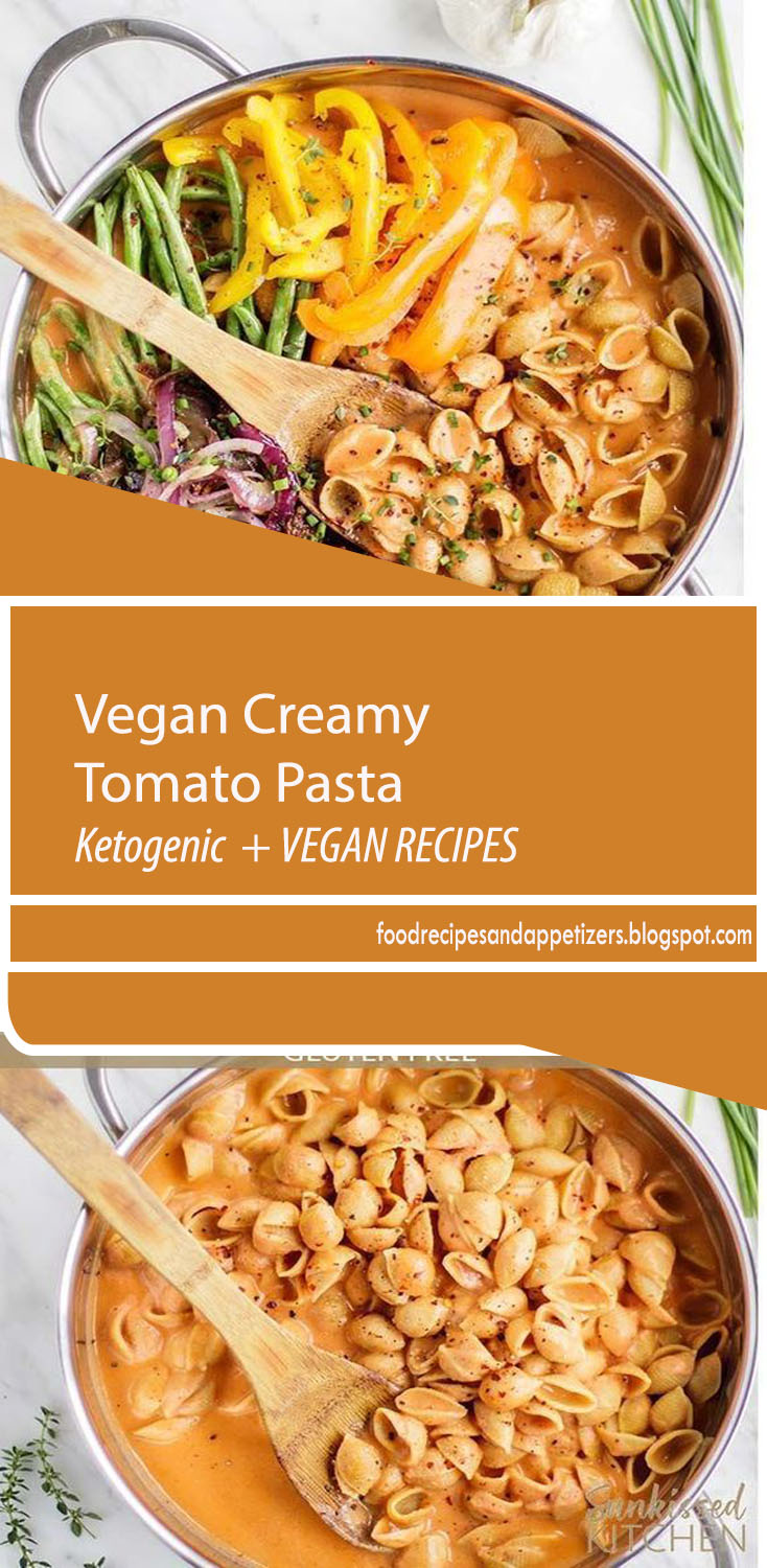 "Vegan Creamy Tomato Pasta / This gluten free pasta is am easy one pot pasta recipe. Smothered in a dairy free creamy tomato pasta sauce, and loaded with sauteed veggies. A great easy dinner! | SUNKISSEDKITCHEN.COM | #sunkissedkitchen #creamytomato #vegan #onepot #onepotpasta #cashewsauce