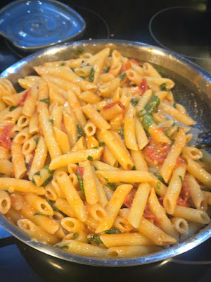 Fresh Tomato Pasta in pot on stove