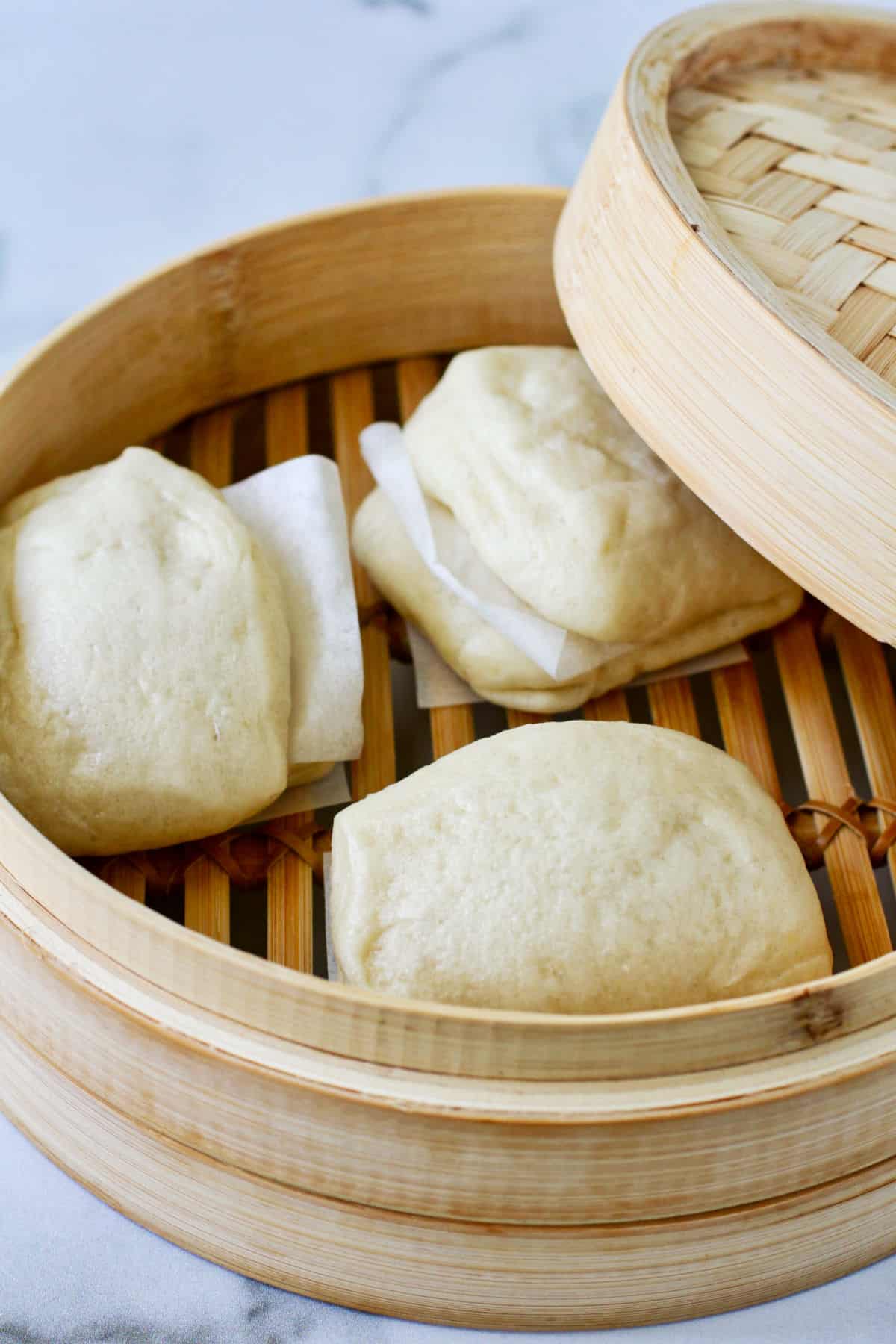 Bao buns in a steamer.